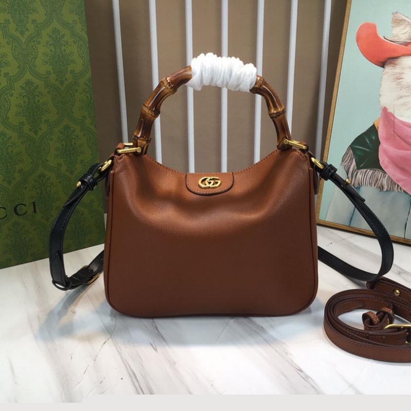 G*u*i top handle bags
